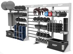 an exercise equipment rack with dumbs, kettles and other items