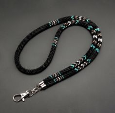 Discover this handmade black beaded teacher lanyard in a Native American style. A stylish badge holder, perfect gift for educators, combining beauty and functionality. **Elegant and Practical Design**   - Beautiful black beaded lanyard adds style to any teacher's outfit.   - Durable design ensures it withstands everyday classroom use.   - Perfect for holding work ID badges securely and stylishly. **Meaningful Native American Influence**   - Intricate beadwork inspired by Native American craftsma Native American Beaded Necklace, Beaded Lanyard, Beadwork Necklace, Teacher Lanyard, Native American Style, Beaded Lanyards, Native American Beading, Native American Fashion, Creative Outlet