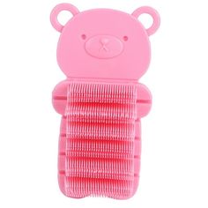 a pink comb with a teddy bear on it