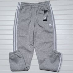 Nwt Adidas Fleece Lined Joggers/Sweatpants, Size L (14), Heather Gray With White Stripes, Has Pockets, Soft Fleece Lined, Elastic Cuffs. Sportswear Sweatpants With Three Stripes For Loungewear, Adidas Sweatpants For Loungewear In Athleisure Style, Adidas Athleisure Sweatpants For Loungewear, Adidas Three Stripes Joggers For Loungewear, Adidas Sweatpants For Loungewear, Adidas Sweatpants For Loungewear, Athleisure Style, Adidas Cotton Activewear For Winter, Adidas Casual Joggers For Loungewear, Adidas Three Stripes Sweatpants For Loungewear