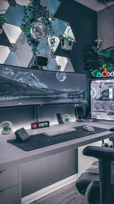 a desk with a computer monitor, keyboard and mouse on it in front of a mirror