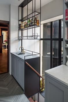 the kitchen is clean and ready to be used as a bar or dining room area