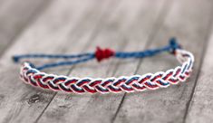 Show your patriotic pride! Red, white and blue colored braided string bracelet can be worn anywhere! Waterproof boho chic friendship bracelet can be worn to the pool, at the beach, working out or in the shower. Colorfast so won't fade when wet. Wear this adjustable bracelet alone or stacked with others for a fun layered look! Have different colors in mind? Convo me for a custom order! I'd be happy to make one just for you! C5 Red And Blue Friendship Bracelet, Casual Red Braided Bracelets For Beach, Patriotic Handmade Adjustable Bracelets, Handmade Patriotic White Bracelet, Red Resizable Braided Bracelet For Beach, Red Adjustable Braided Bracelet, Patriotic Bracelet, Colored Braids, Surfer Bracelets