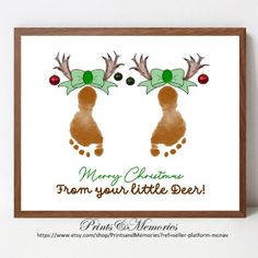 a christmas card with two reindeers wearing green bows