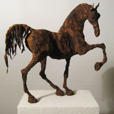 a sculpture of a horse is on display