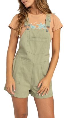 " Overalls made for late summer. Pull it on, adjust the straps to perfection, slip your phone and keys into one of the large pockets, and enjoy the day. The relaxed, oversized silhouette floats around your body during hot afternoons while providing lower-body coverage for cooler evenings. Fit & Design Regular fit overalls Full length straight leg In an easy silhouette with plenty of room to move Adjustable spaghetti straps The mix of side and patch pockets give you plenty of places to carry essentials Additional Details The cotton/viscose blend fabric is soft, breezy, and comfortable Distressed wash adds lived-in softness " Surf App, Easy Silhouette, Enjoy The Day, Roxy Women, Cotton Viscose, Oversized Silhouette, Late Summer, Lower Body, Roxy