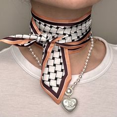 If You’re Looking To Secure Your Chic Status, Look No Further Than The Maroon, Orange, Black, & White Checkered Skinny Scarf. It Features A Unique Checkerboard Print Bordered By Maroon And Beige Stripes That Lends A Sophisticated Touch To Your Outfit. Meanwhile, The Silky Smooth Fabric Is Lightweight On Warm Days And An Excellent Layering Piece In The Winter. -Brand New, Never Worn -Material: 100% Silk -Double Layers -Measurement: 35"*2" -Imported Please View All Details From The Pictures Before Purchasing. Feel Free To Ask Any Questions Or Photos. No Trade. No Returns. Tags: Contemporary, Causal, Glam, Office, Event, Dating, Party, Vacation, Night Out, Club, Prom, Baby Sh Glam Office, Night Out Club, Burgundy Scarf, Pucci Vintage, Black White Checkered, Rainbow Scarf, Denim Projects, Floral Silk Scarf, Art Scarves