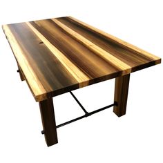 a wooden table with metal legs on a white background