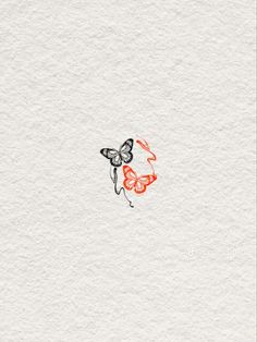 a drawing of a butterfly with red and black wings on it's back side