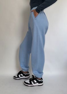 Our on trend Fleece Lined Joggers are a closet staple! Featuring a high waisted fit and pockets, these sweatpants will keep you super warm and comfortable. Jill is wearing size Small. 100% Polyester Cozy Fleece Sweatpants With Pockets, Comfy Blue Sweats With Ribbed Cuffs, Casual Fleece Pants For Loungewear, Trendy Sweats With Ribbed Waistband For Jogging, Comfy Sweatpants For Jogging, Comfy Solid Sweats For Jogging, Comfy Sweats For Jogging, Cozy Fit Fleece Sweatpants With Pockets, Comfy Winter Sweatpants With Pockets