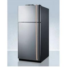 a black refrigerator with gold trimmings on the door and bottom shelf, in front of a white background