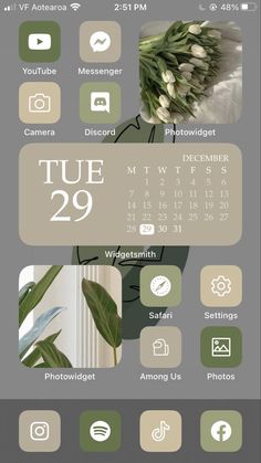 the calendar is displayed on an iphone's screen with flowers and other things around it