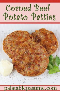 two crab cakes on a white plate with butter and parsley next to it is the title text reads corned beef potato patties