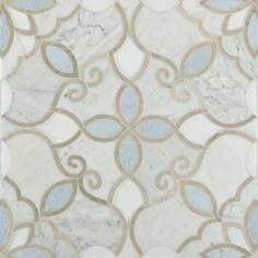 a white and blue marble tile with gold trimmings on the bottom half of it