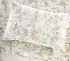 disney princess bedding sheets and pillowcases on a white sheet with floral designs