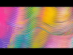 an abstract rainbow colored background with wavy lines