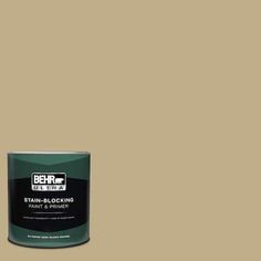 a can of behr paint on a beige background with the words, stain - blocking paint