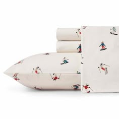 sheet set with ski print on white background