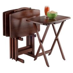 two wooden folding tables with drinks on them