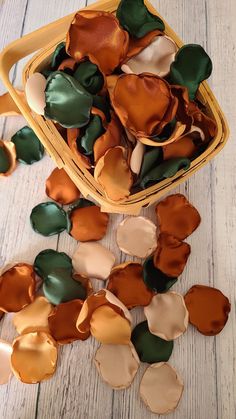 a basket filled with lots of different colored petals