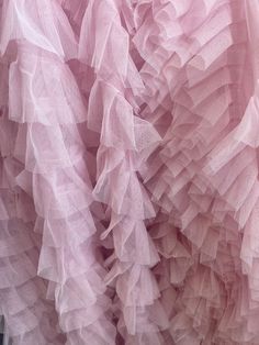 pink ruffled fabric hanging from the ceiling