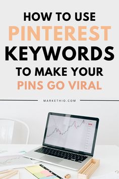 a laptop computer sitting on top of a desk with the words how to use pinterest keywords to make your pins go virtual