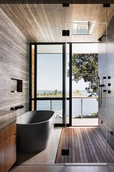 a large bath tub sitting inside of a bathroom