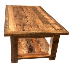 a wooden table made out of pallet wood with two shelves on each side and one shelf at the top