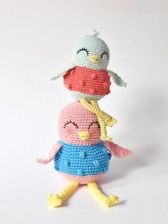 three crocheted stuffed animals are stacked on top of each other in the same pattern