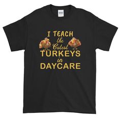 a black t - shirt that says i teach the turkeys in day care