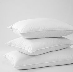 three pillows stacked on top of each other