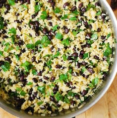 rice with black beans and cilantro in a pan