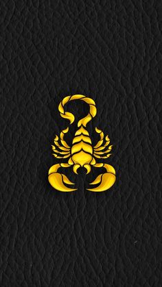 a yellow scorpion on black leather