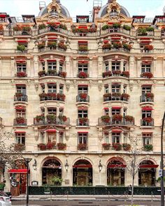 an old building with many windows and balconies