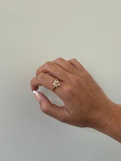 Flower ring - This adjustable dainty flower ring is incredibly stunning. Made to sparkle and shine on any finger! A perfect gift for women, girlfriend, best friends, sisters, moms. A perfect option for those who like minimal dainty gold rings and want to have the perfect size. - gold filled- stainless steel and gold- cz stones- Style: Minimalist Dainty Jewelry For Spring Anniversary, Dainty Jewelry For Anniversary In Spring, Dainty Spring Jewelry For Anniversary, Delicate Jewelry For Anniversary In Spring, Delicate Jewelry For Spring Anniversary, Rose Gold Ring For Spring, Delicate Spring Jewelry For Anniversary, Spring Rose Gold Ring Jewelry, Spring Wedding Rose Gold Flower Ring