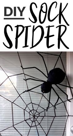 a spider made out of yarn sitting on top of a window sill with the words diy sock spider