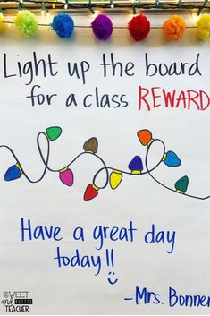 a sign with lights on it that says, light up the board for a class reward have a great day today