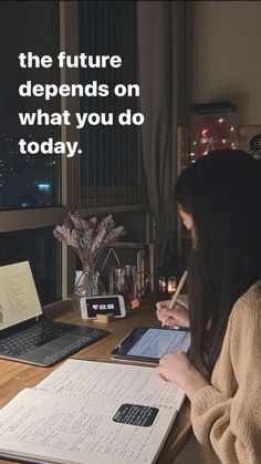 a woman sitting at a desk writing on a piece of paper with a pen in her hand