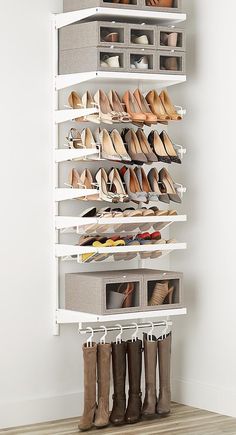 the shoe rack is holding several pairs of shoes