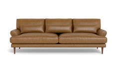 a brown leather couch sitting on top of a white floor