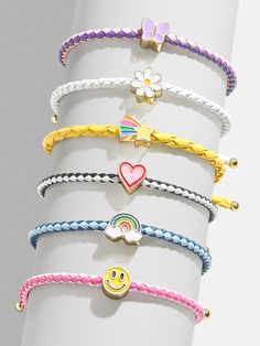 Hop on a magical adventure with the Somewhere Over the Rainbow Bracelet Set! This super cute bracelet set is packed with colorful charms that bring smiles and a whole lot of good vibes! Each bracelet features a special charm that reminds you of all the happy things in life! Whether you wear them all together or pick your favorite charm, you’ll feel like you’re walking in a world full of magic, love, and happiness. Please note: intended for children 3+ Kids Valentines Day Gifts, Kids Bracelet, Kids Valentines Day, Gold Beaded Bracelet, Magical Adventure, Magic Love, Cute Bracelet, Kids Valentines, Kids Bracelets