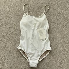 Reposhing This Item I Purchased From @Wohlale. Loved It, But Ready To Rotate For Something New. Runs Size Small, So Fits Like A 6 Vs 8 Which Is Why I’m Reposting. Style Is Amazing Questions? Leave A Comment Below! White Fitted Workout Swimwear, Casual White Seamless Swimwear, White Sports Swimwear For Spring, White Athleisure Swimwear For Poolside, White Athleisure Swimwear For Beach Season, Lululemon Long Sleeve, Surf Suit, Striped One Piece, Red Baby