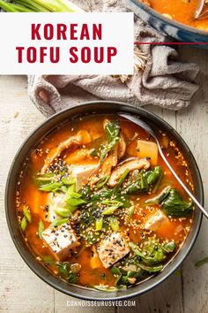 korean tofu soup with broccoli and carrots in a bowl