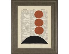 an art print with three circles on top of a book page in grey and orange