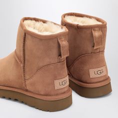 Find UGG Classic Mini Ii Chestnut Boot on Editorialist. Chestnut suede ankle boot from UGG featuring sheepskin and suede upper, round toe, sheepskin insole and Treadlite sole by UGG. Boot height: 13.97 cm. 100% Sheep skin or lambskin / Rubber sole Ugg Classic Mini Ii, Chestnut Boots, Ugg Boot, Ugg Classic Mini, Sheep Skin, Ugg Classic, Pumps Flat, Crossbody Tote, Classic Mini