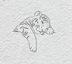 a black and white drawing of a tiger sleeping on top of a wall with the caption's name written below it