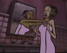 a woman in a pink dress holding onto another woman's neck while standing in front of a mirror