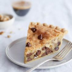 a slice of chocolate chip pie on a plate with a fork