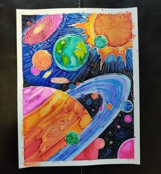 an art project with watercolors and colored pencils on paper, depicting the solar system