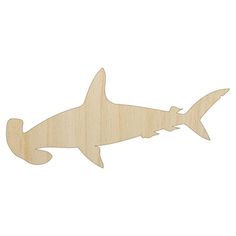 a wooden cutout of a shark